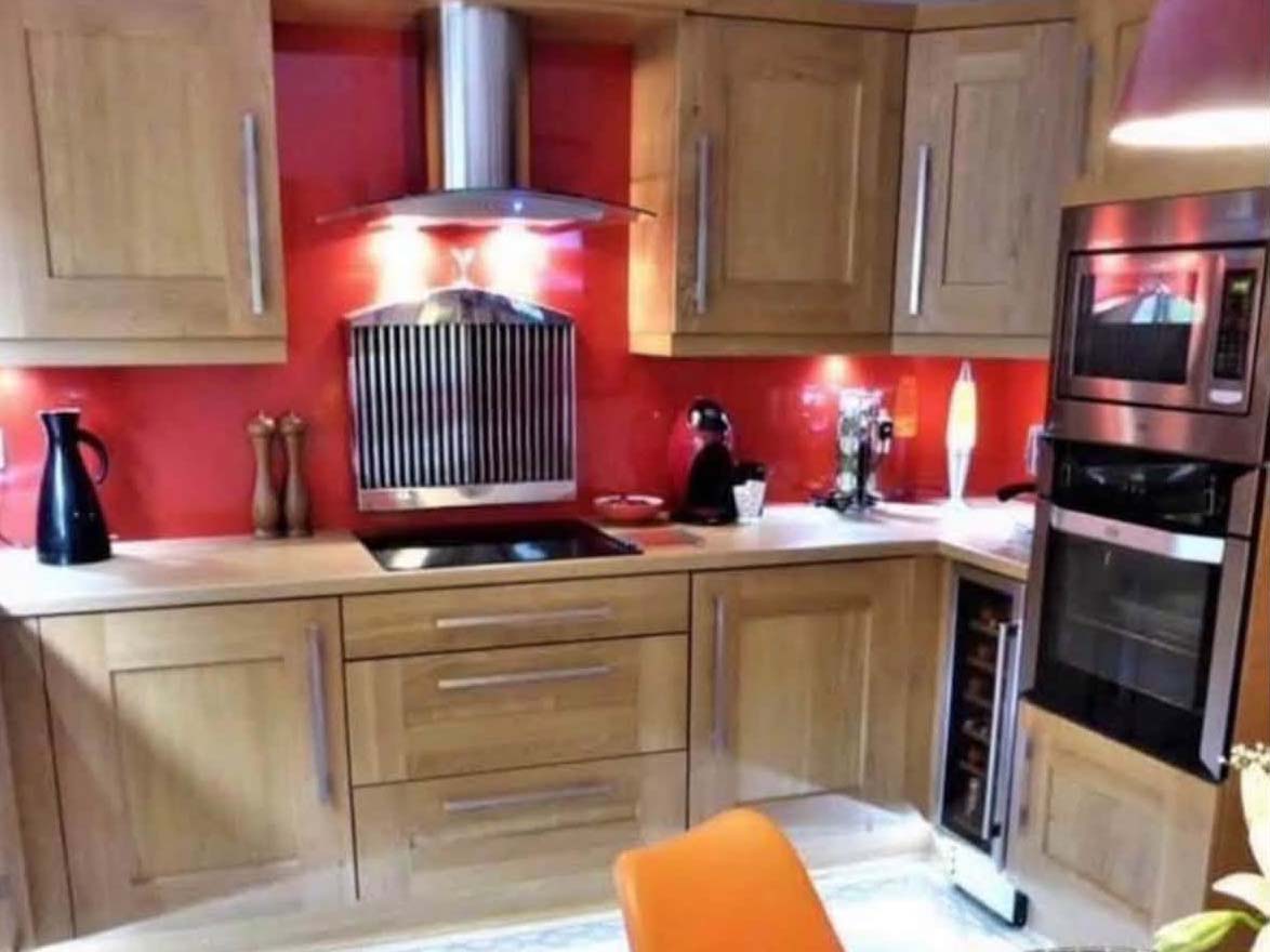 Red and wooden kitchen after spray